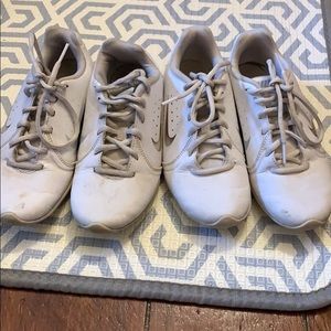 2 pairs of women cheer shoes